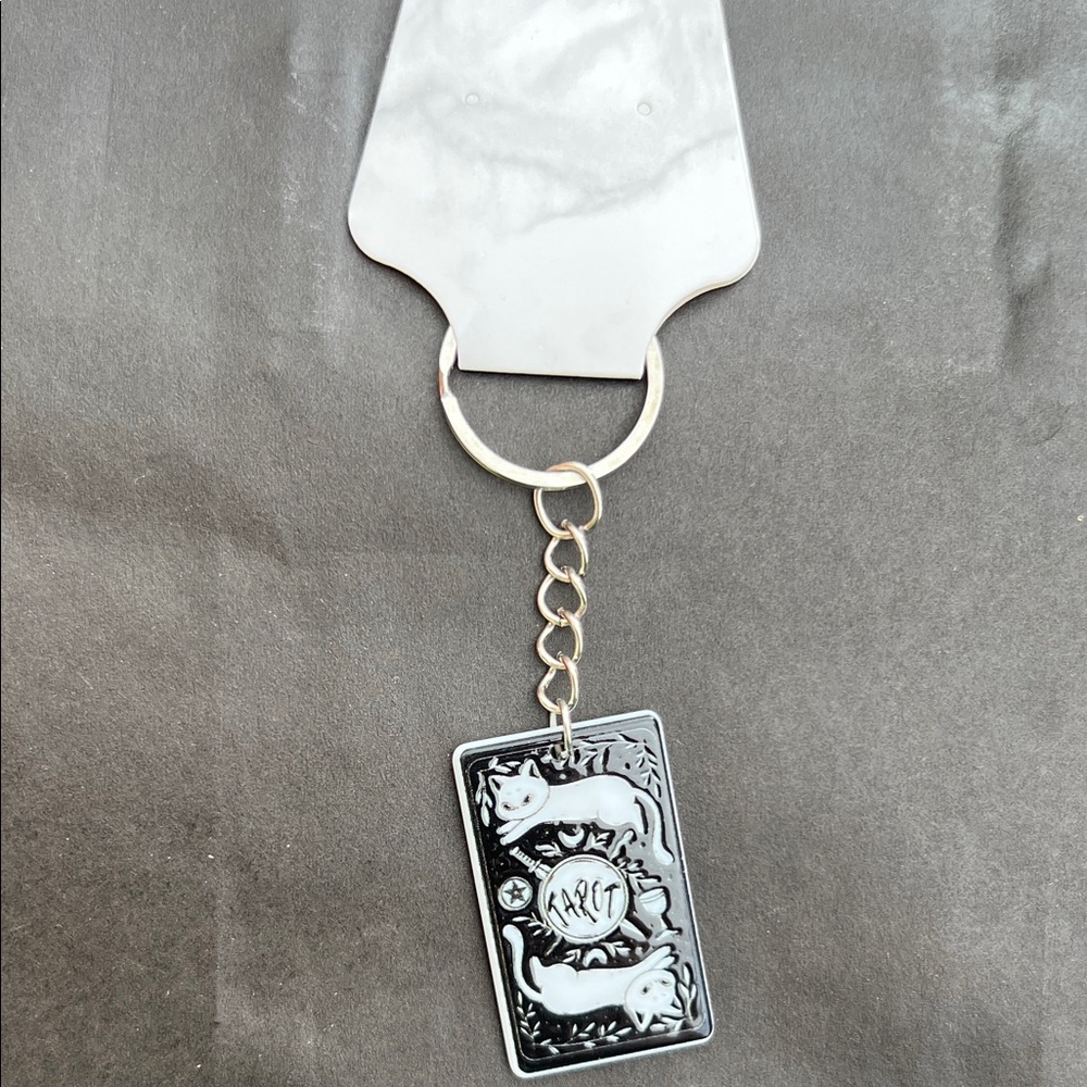 Black and Silver Keychain with Cat Design